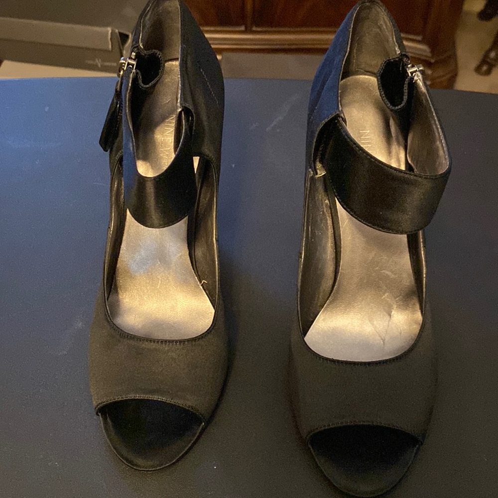 Black Satin Nine West classic shoe.